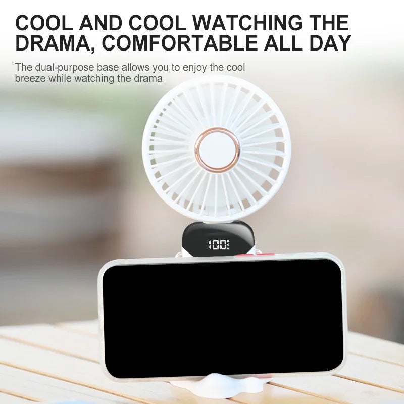 Portable fan with smartphone holder on a blurred background